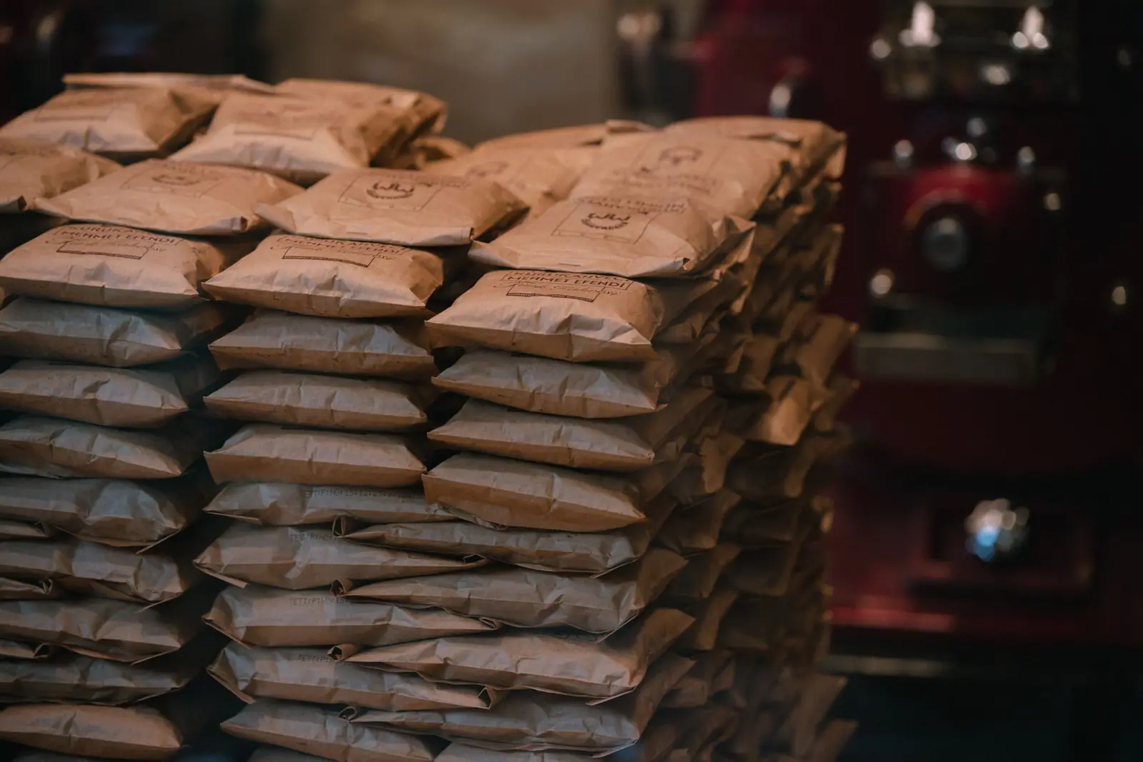 Stacked paper sacks on pallets in a warehouse